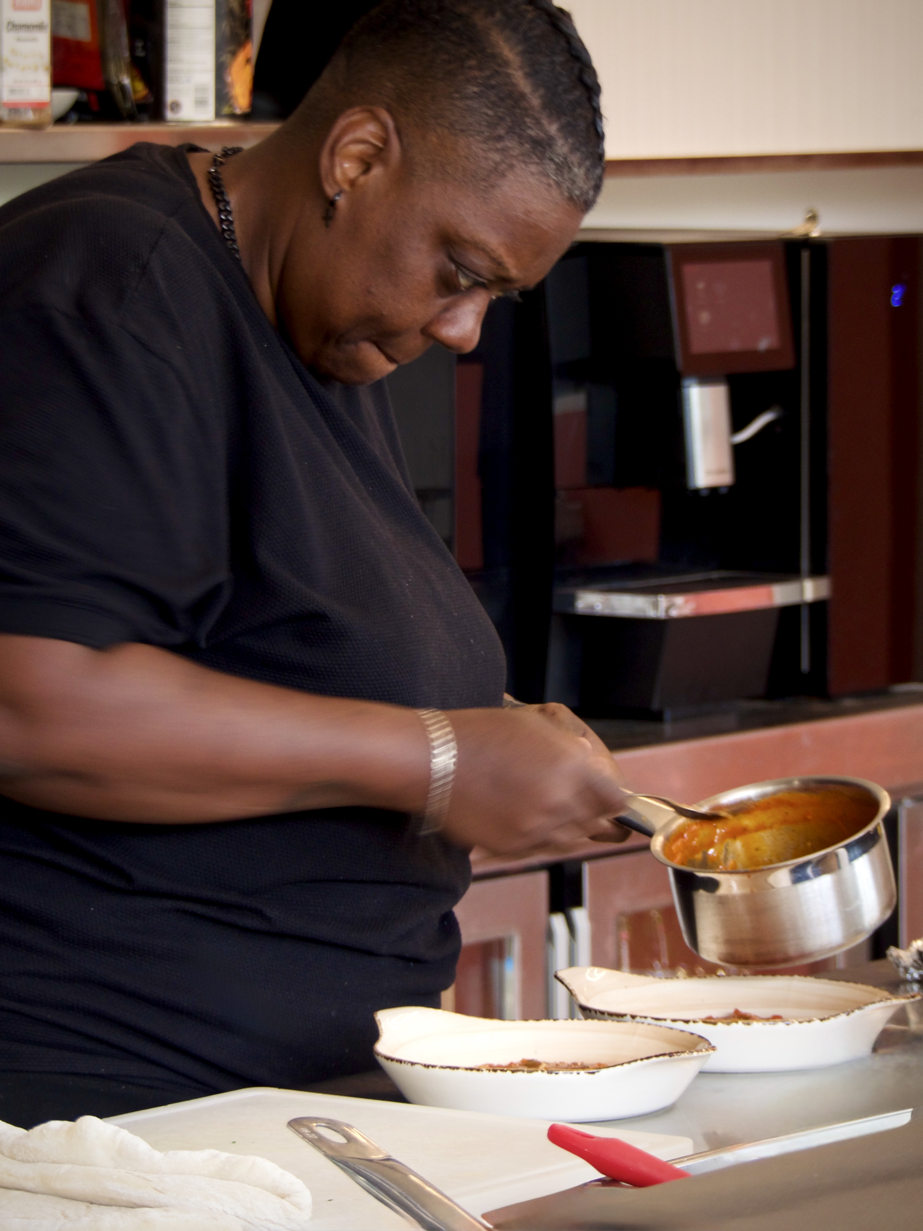 El Canton chef preparing a dish with care